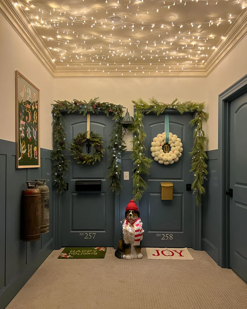 bedroom doors that look like apartment doors decorated for Christmas