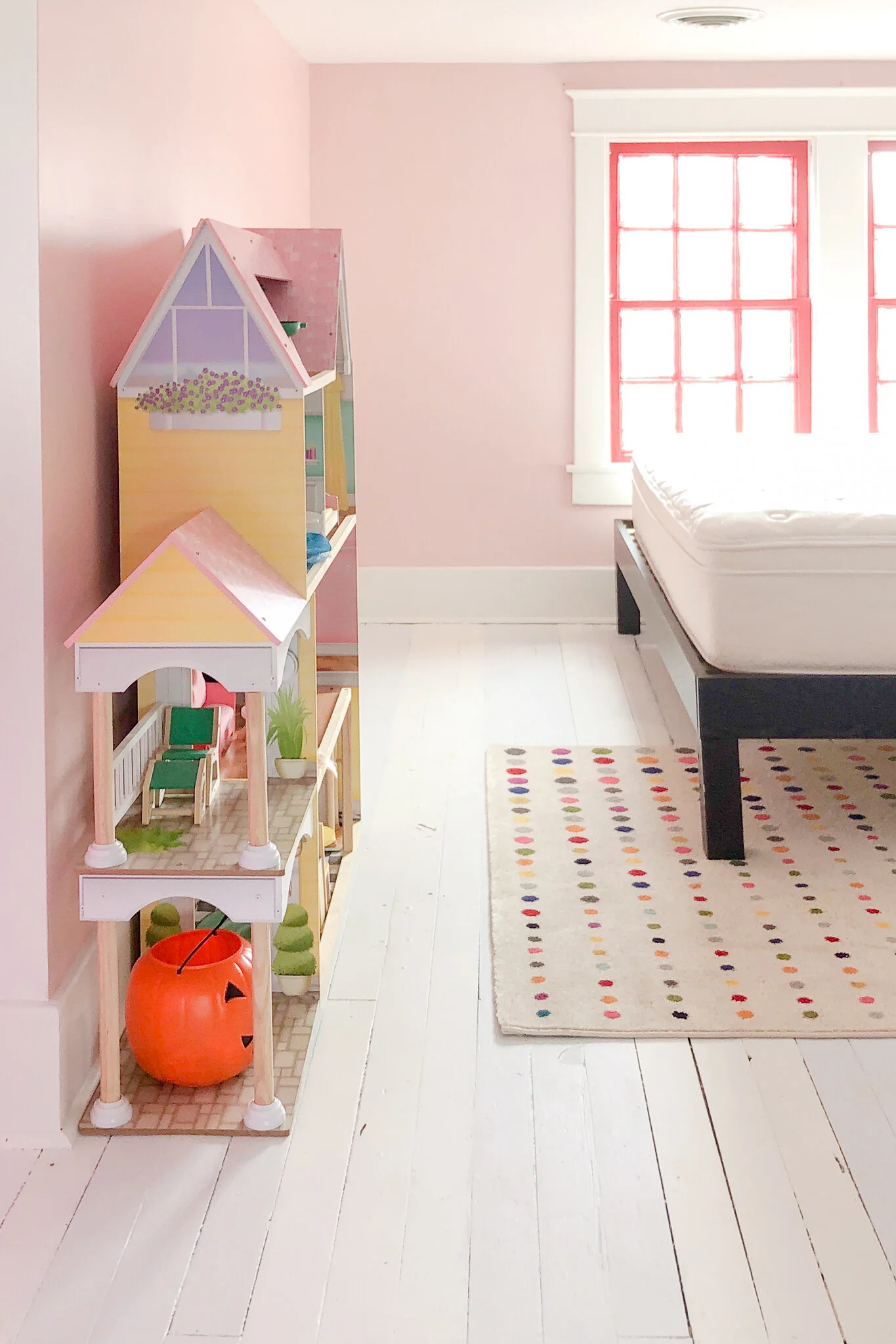 white painted hardwood floors in colorful room