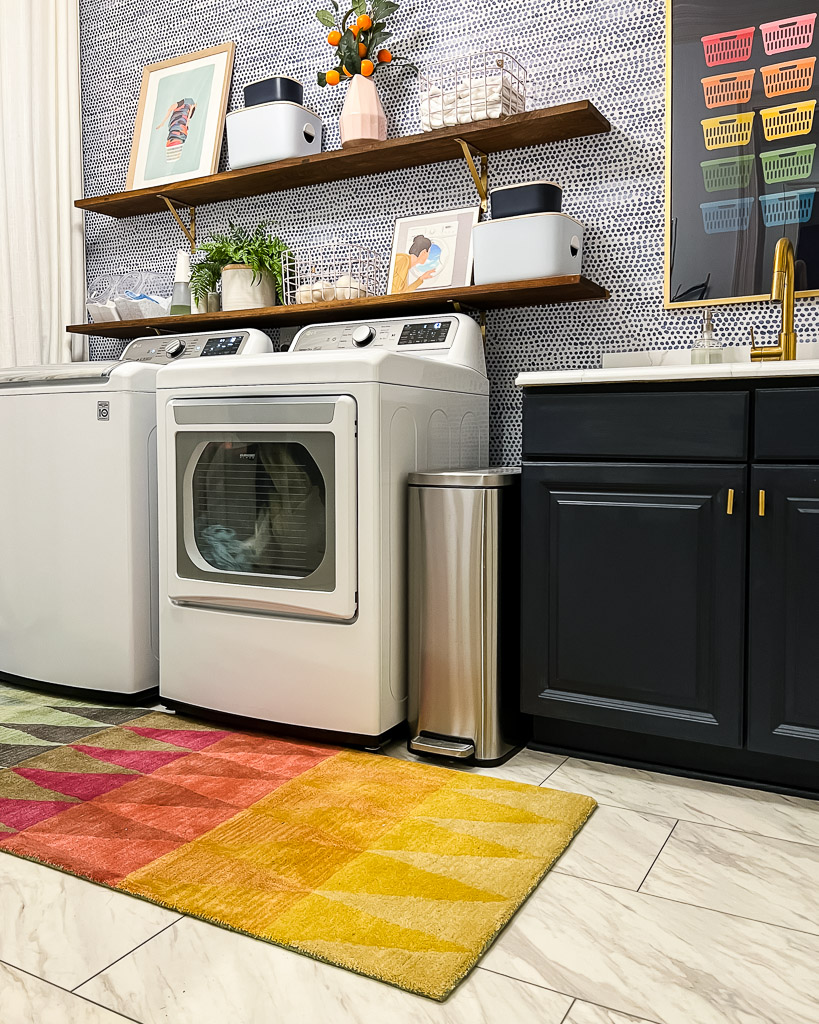diy wall shelves in colorful laundry room
