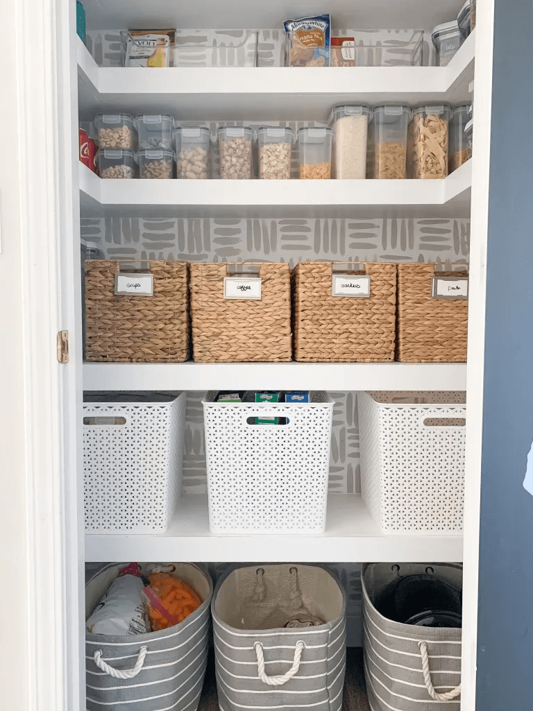 organized pantry with labeled baskets and bins