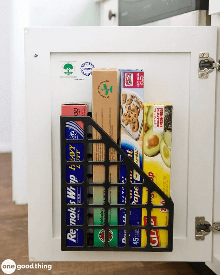 magazine holder on inside of cabinet door for food wraps and bags