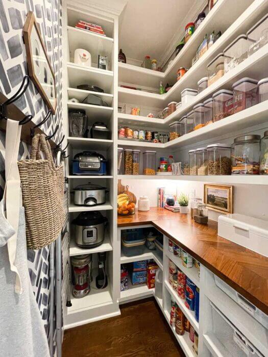 walk-in pantry with small shelves for appliances