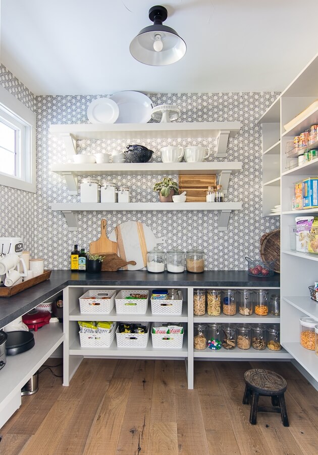 pantry with bins and open shelving