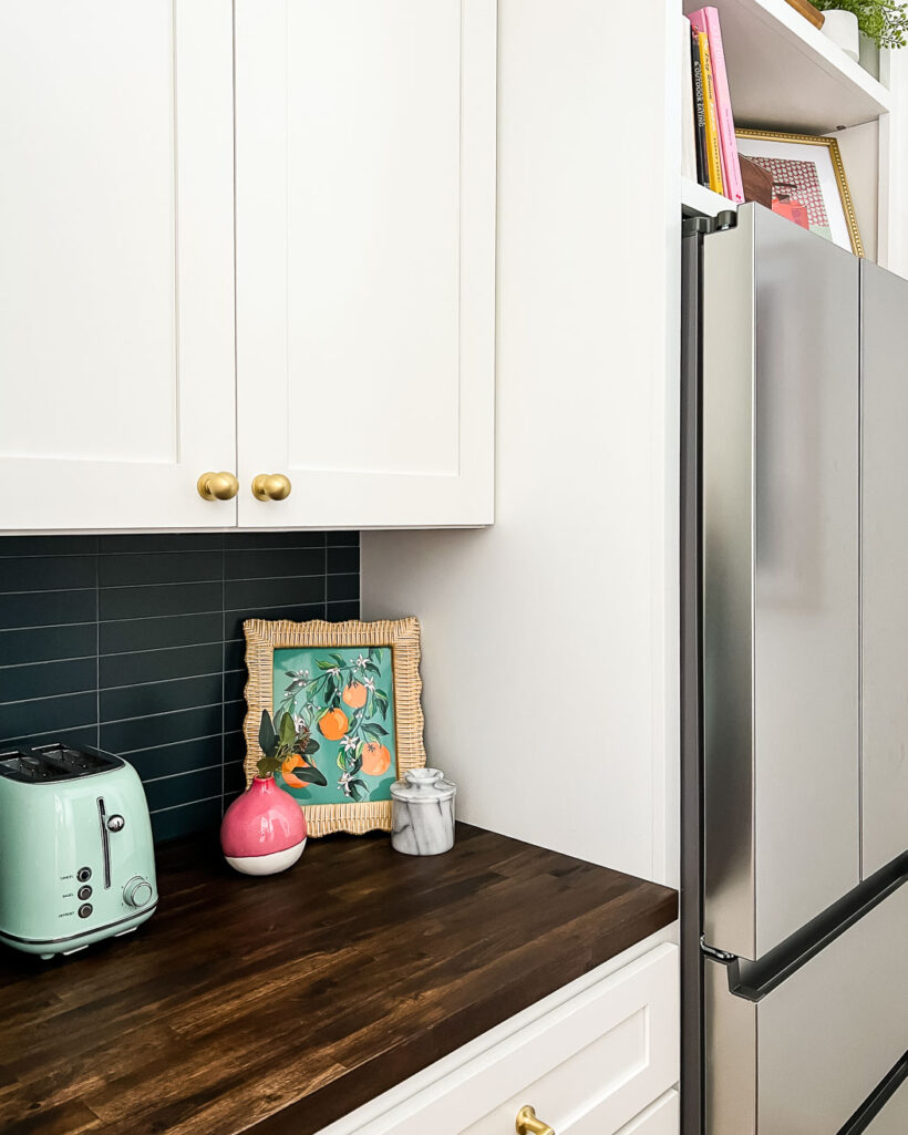 colorful butler's pantry with navy blue tile and white cabinetry by Tasha Agruso of Kaleidoscope Living