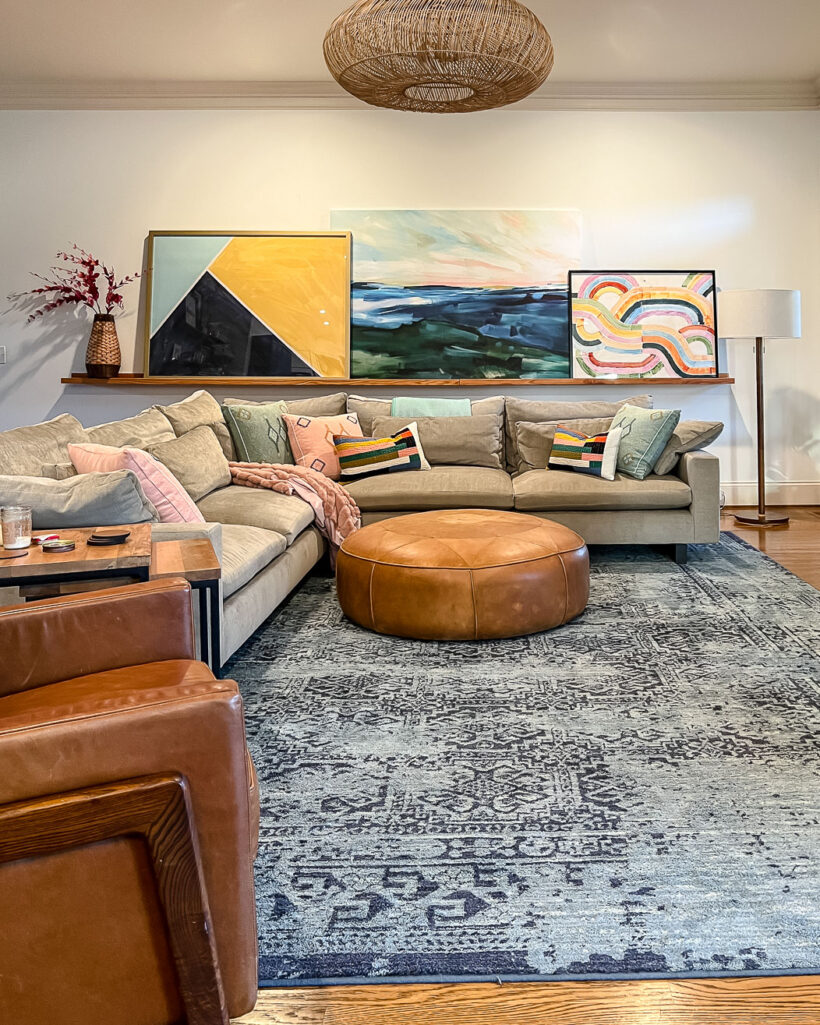 colorful family room with large art on art ledge