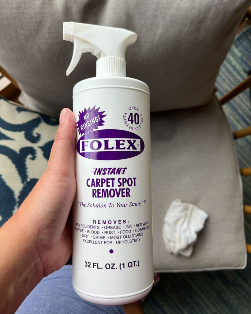 Folex carpet cleaner in woman's hand