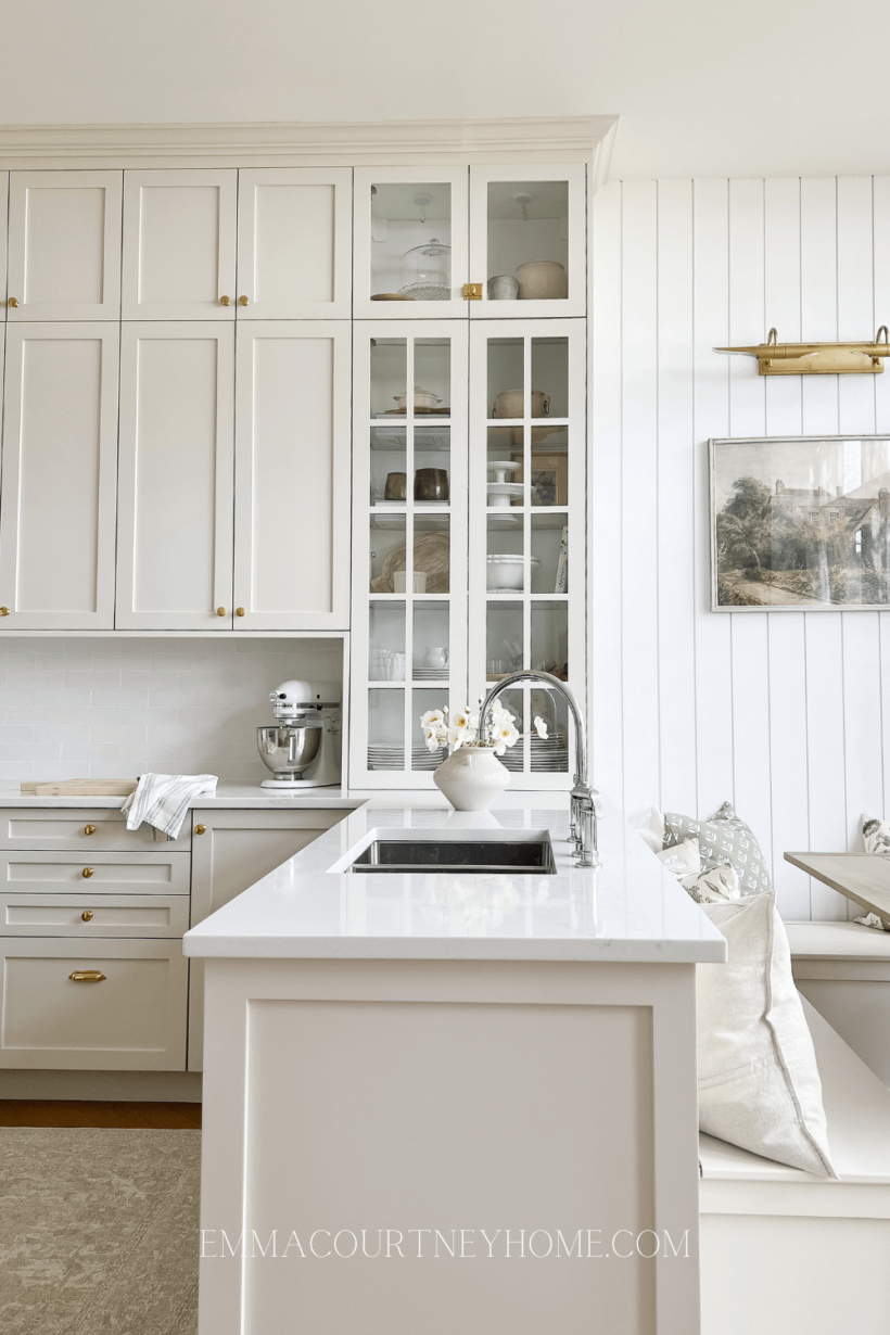 Natural Cream cabinets and white walls in kitchen