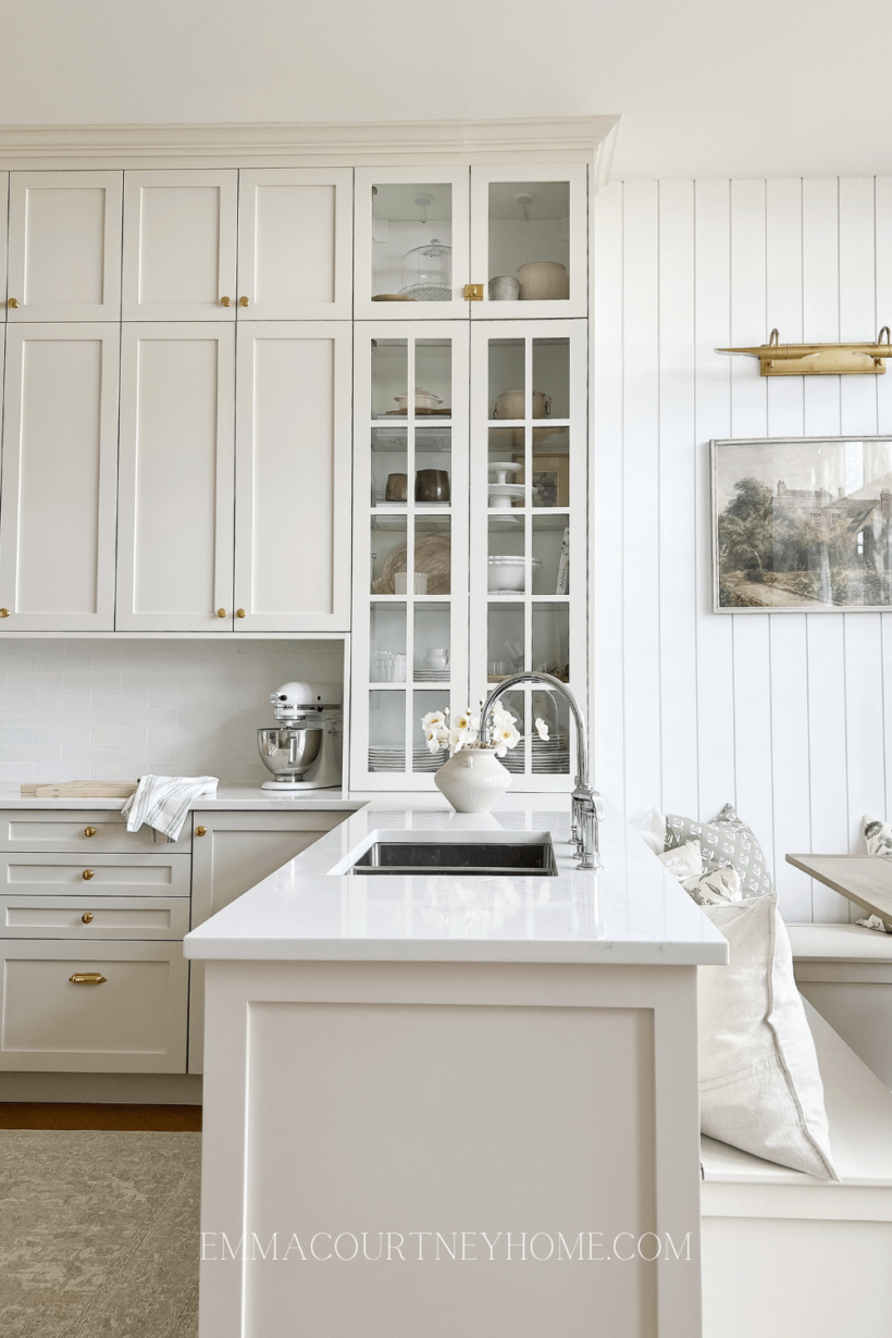 Natural Cream by Benjamin Moore cabinets and white walls in kitchen