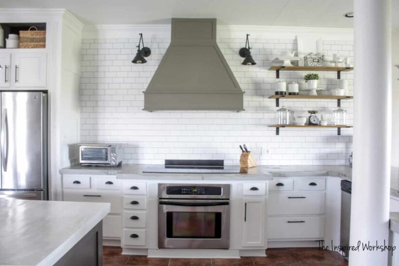 Pure White on kitchen cabinets with dark vent and open shelving