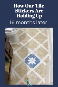 photo of bathroom floor with text that says how our tile stickers are holding up 16 months later