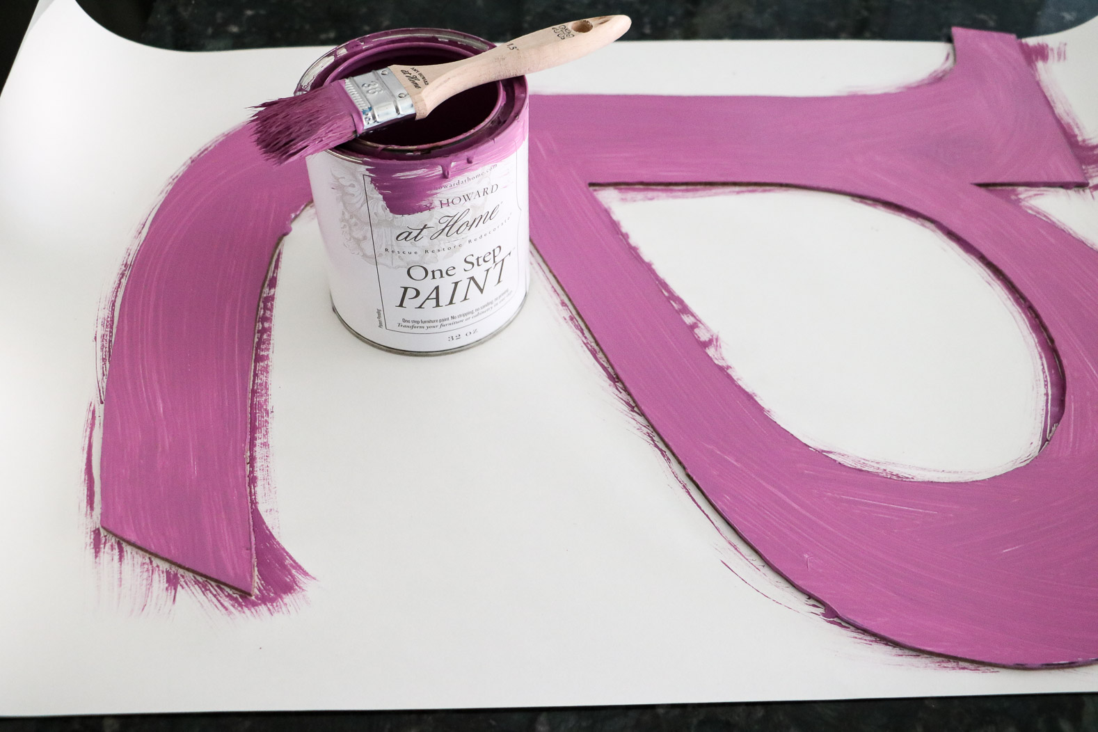 large DIY wall letter painted purple