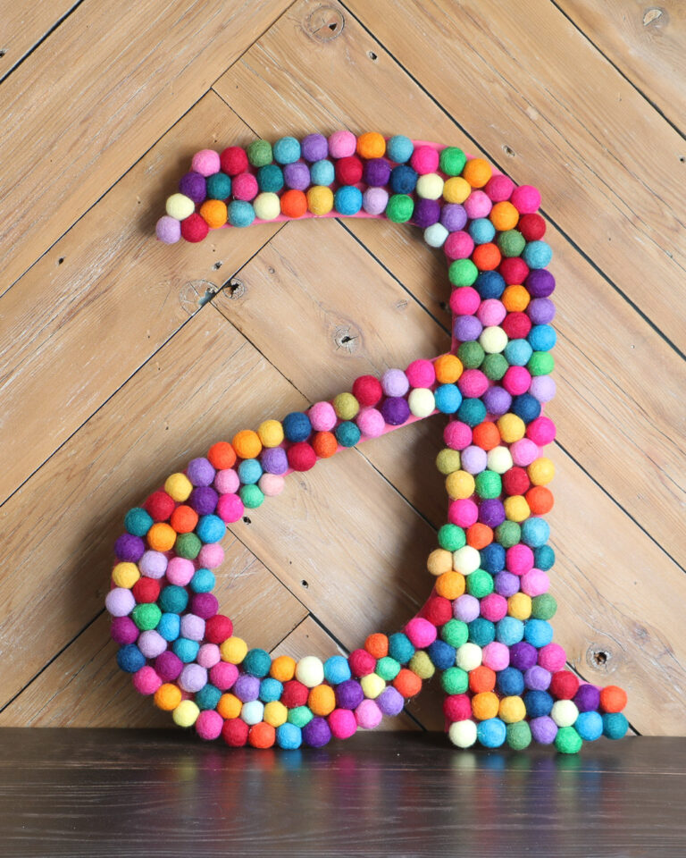 colorful large diy wall letter made with felt balls