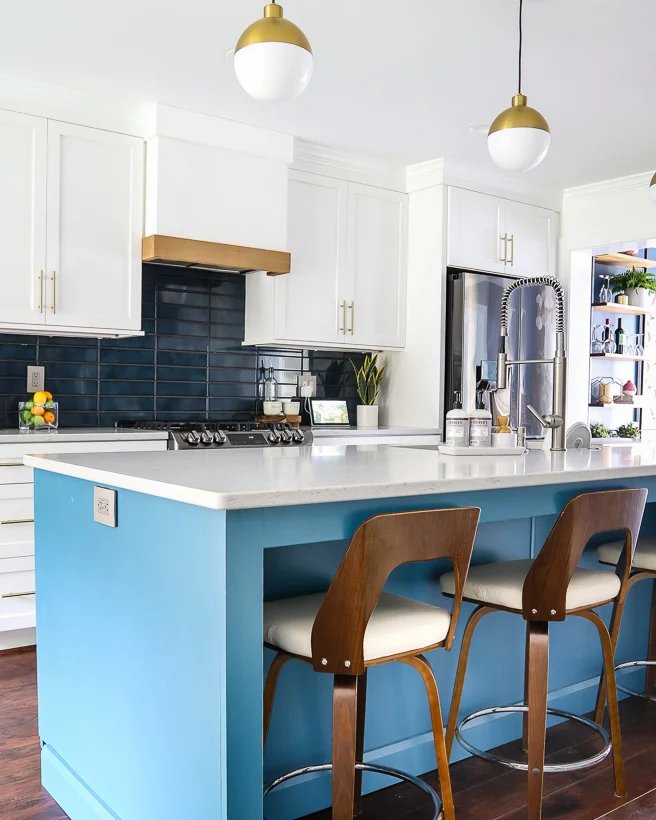 Sherwin Williams Pure White kitchen cabinets with Silken Peacock blue island