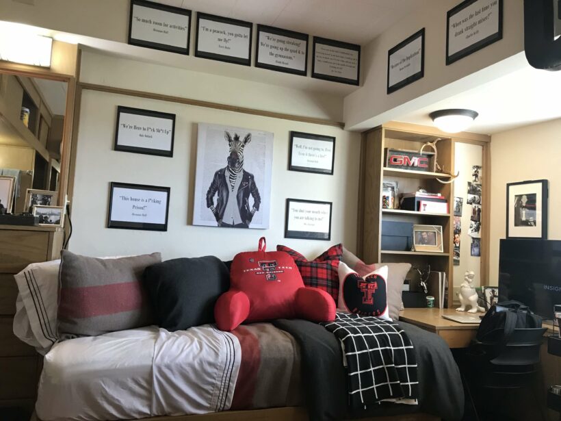 guys' black, red and white dorm room with zebra art and inspirational quotes 