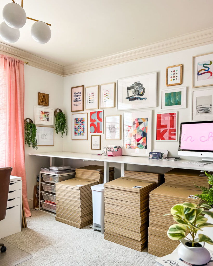 colorful gallery wall in home office