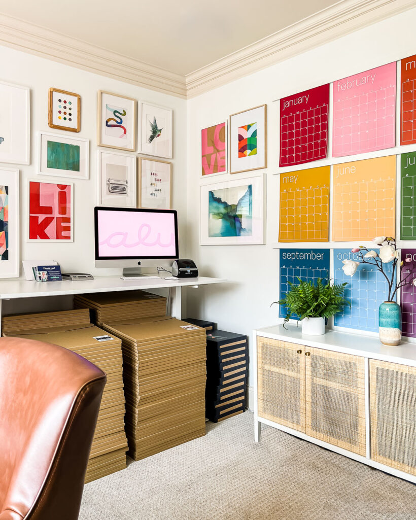 colorful home office with gallery wall