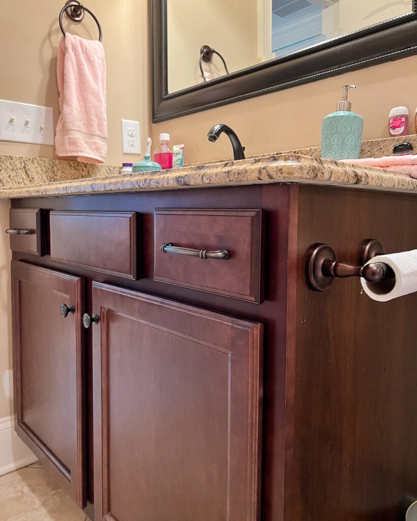 outdated dark wood bathroom vanity