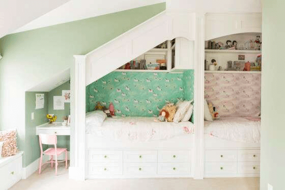 white built in beds with drawers underneath and shelves above