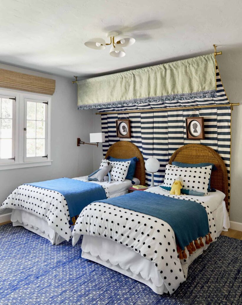 twin wicker beds with striped double canopy and polka dot bedspreads