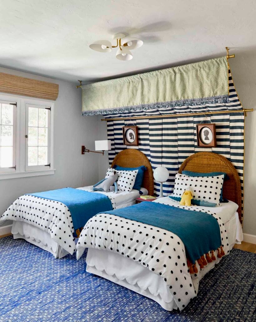 twin wicker beds with striped double canopy and polka dot bedspreads