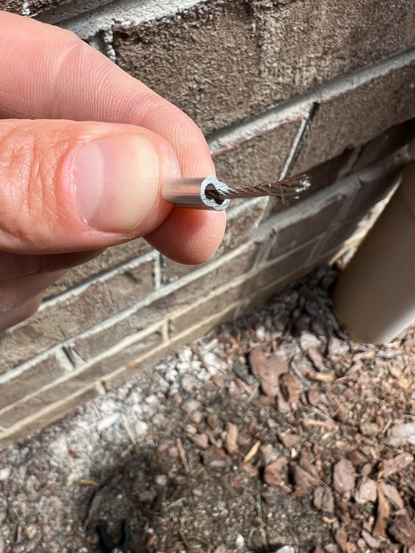 threading wire rope through aluminum ferrule for diy wire trellis