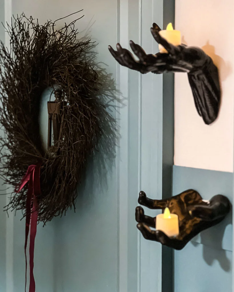 kid's bedroom door with Halloween wreath and door knocker