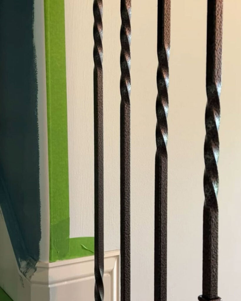 Image of painter's tape applied to rounded corner of wall where two different paint colors will meet up